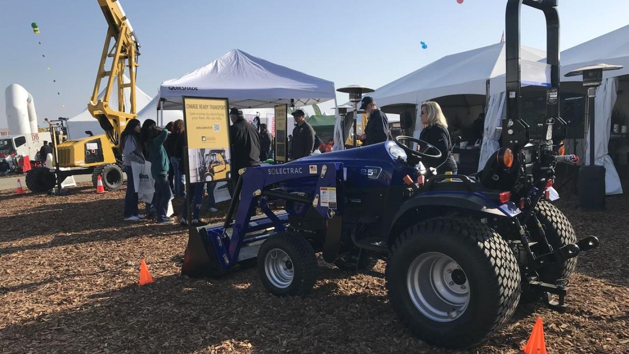 tractor outside near tents at the World Ag Expo 
