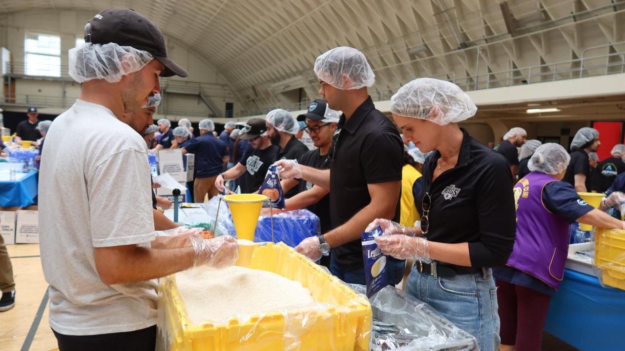 Volunteers from the LA Kings and Blue Shield of California gathered at the LAFD Frank Hotchkin Memorial Training Center to assemble meal kits for families in need.