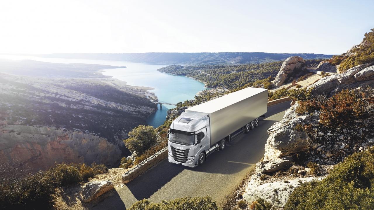 truck driving on scenic highway
