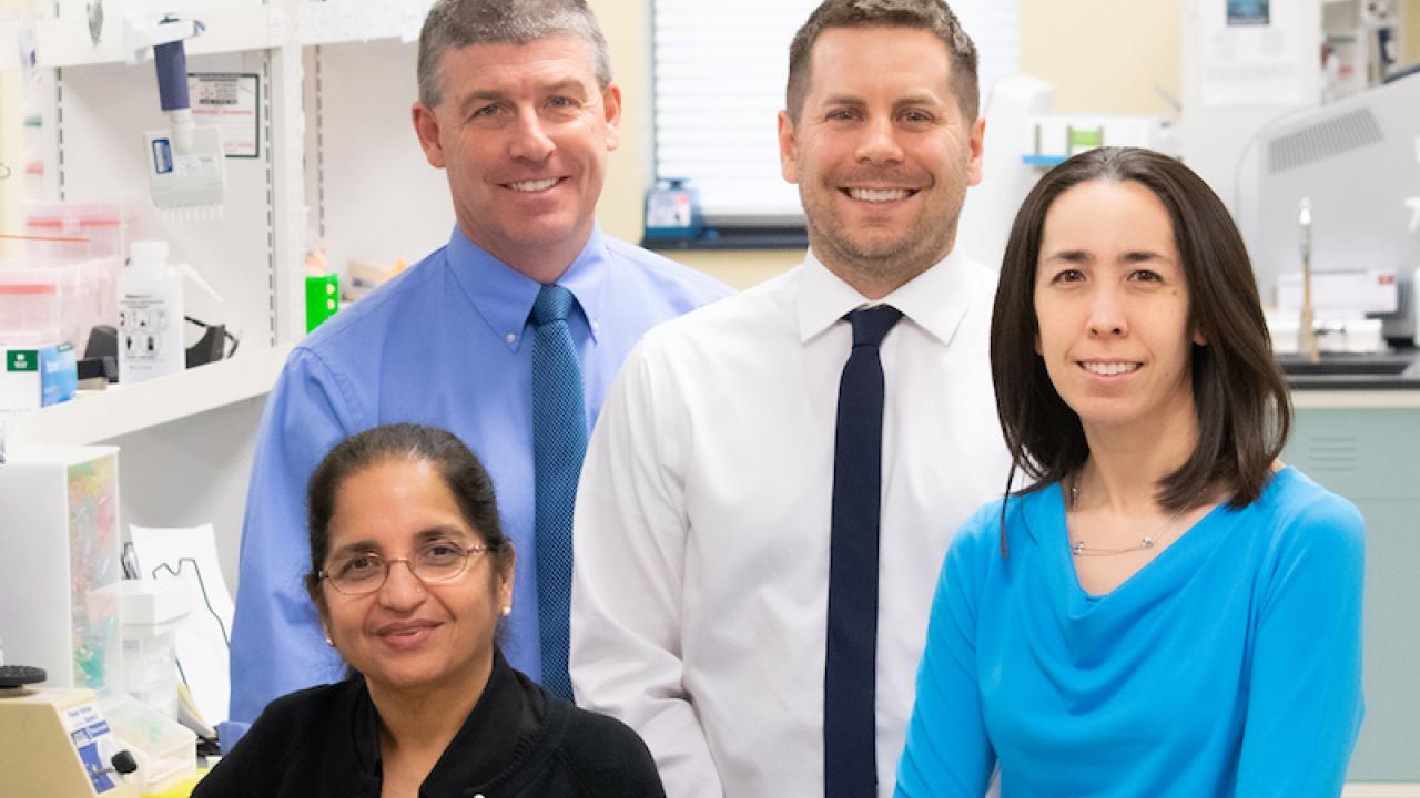Dr. Mike Friez (second from left) directs Greenwood’s diagnostic laboratories. From left to right, he is joined by Associate Director Fatima Abidi, PhD; Associate Director Raymond Caylor, PhD; and Lead Director Jennifer A. Lee, PhD, all of Greenwood’s Molecular Diagnostic Laboratory.