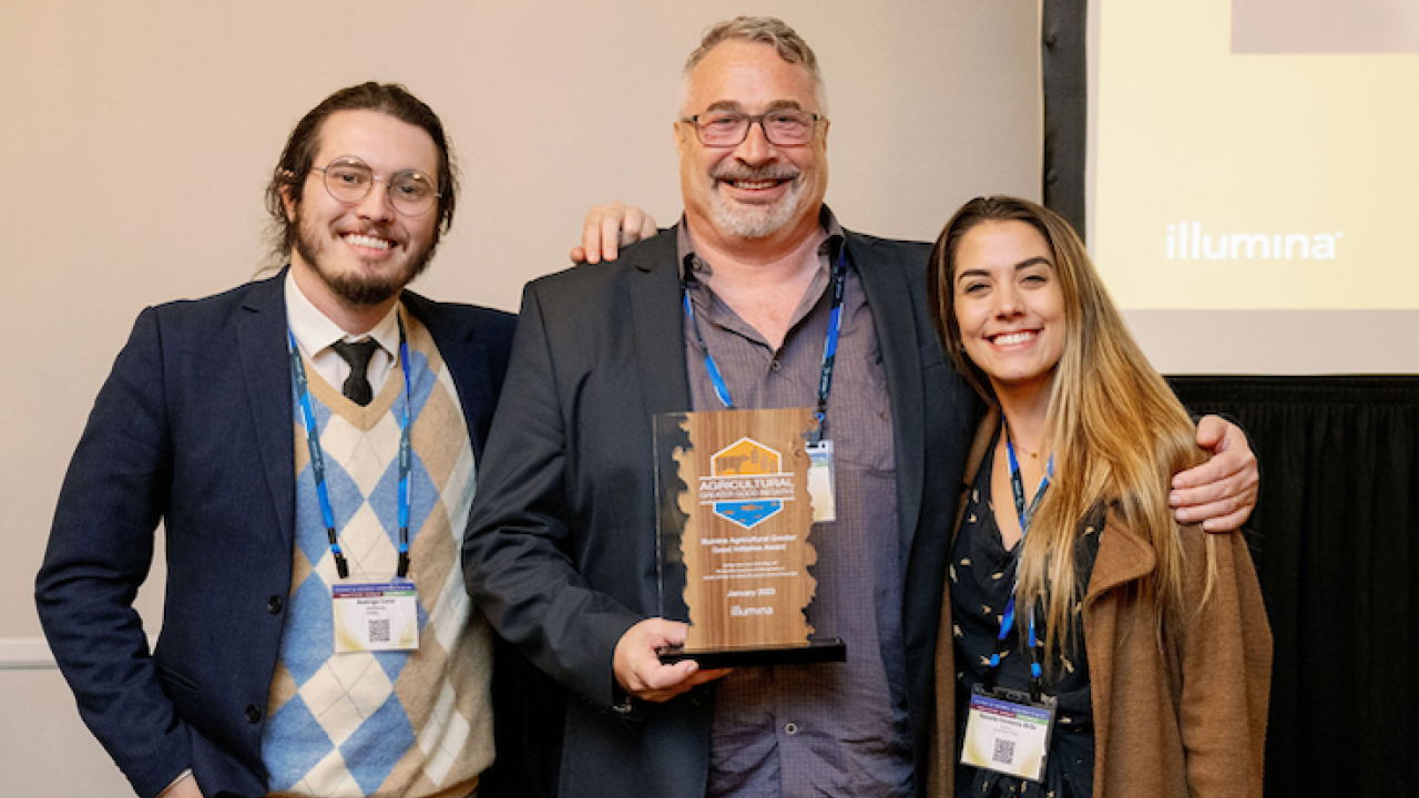Rodrigo Cano and Scott Fahrenkrug of the Brazilian Consortium for Phycogenomics, winner of the Illumina Agricultural Greater Good Initiative Award, with Natalie Fontenla