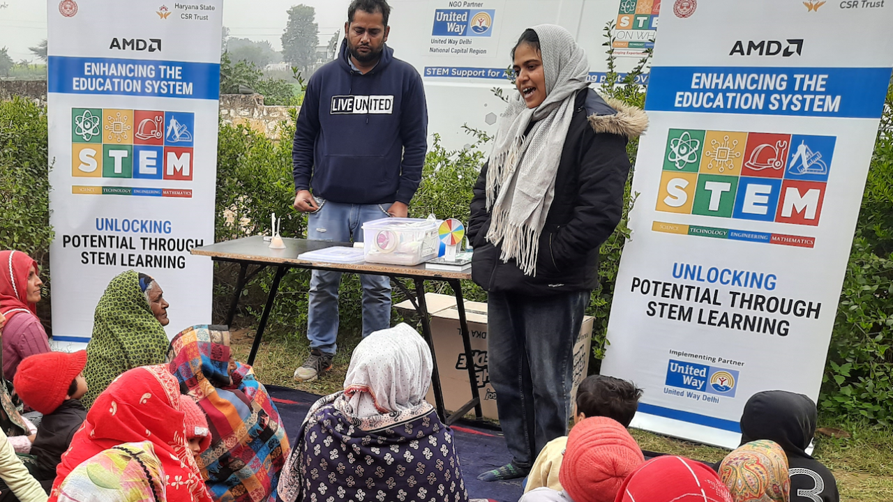 2 teachers at a India Stem event