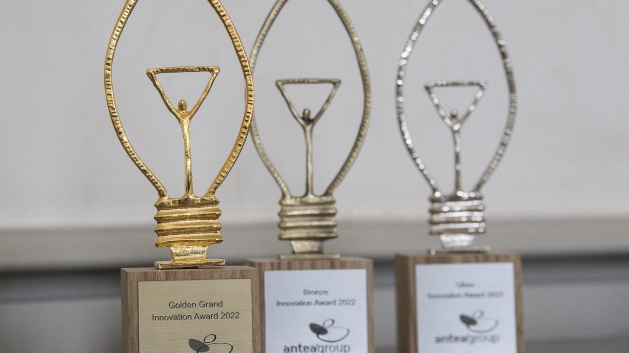 three award trophies
