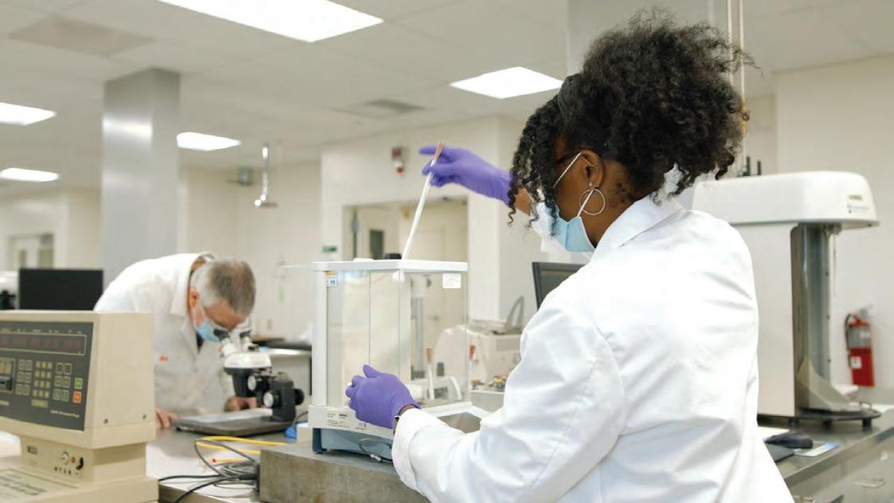 Two people at work in a lab