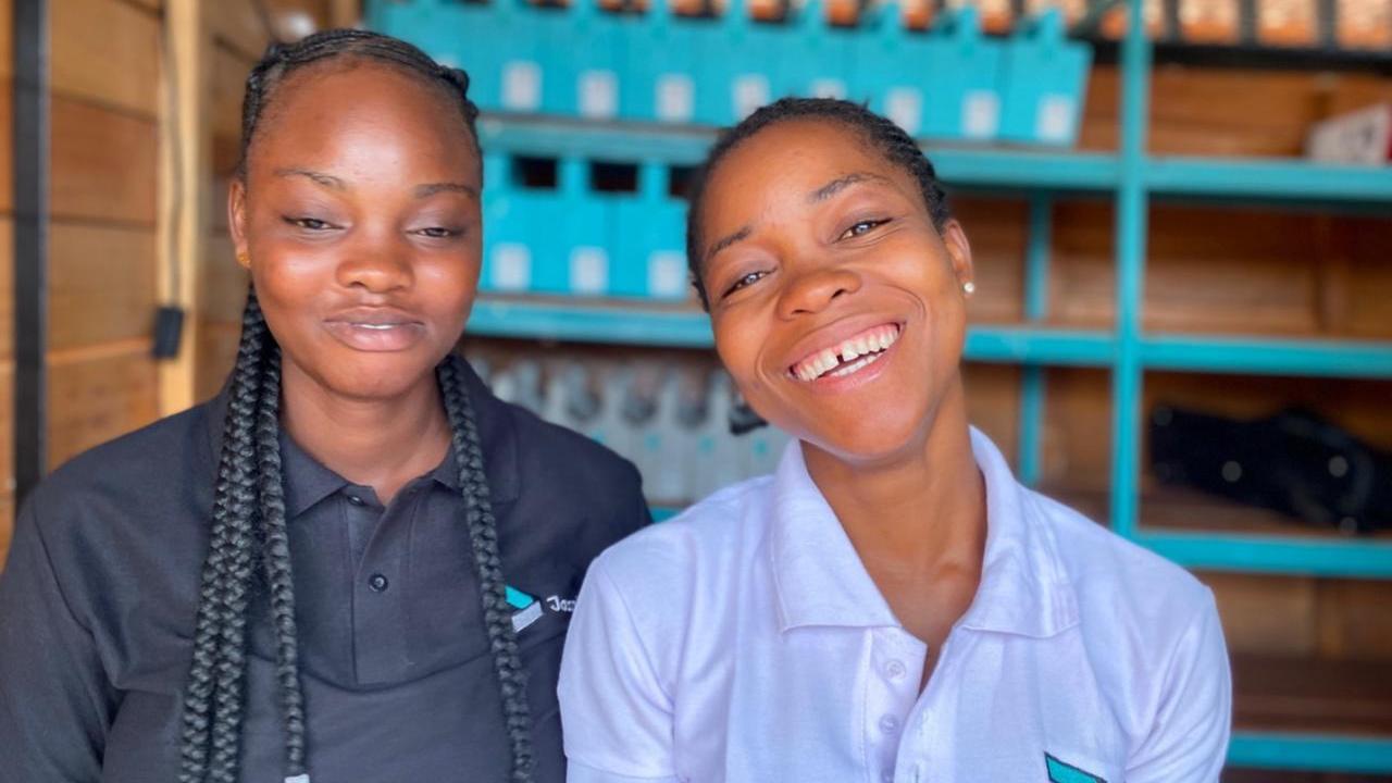 Two smiling people