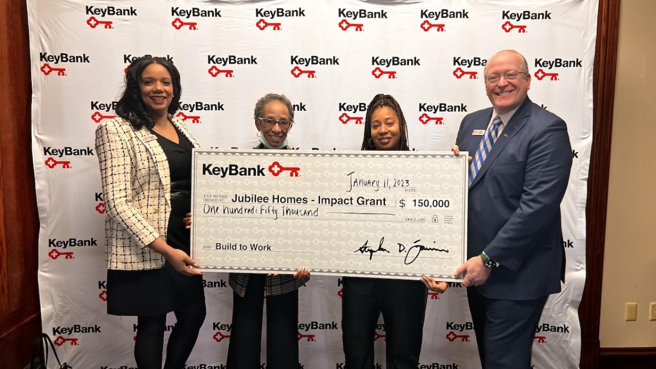 Jubilee Homes and Keybank Team with Grant check.