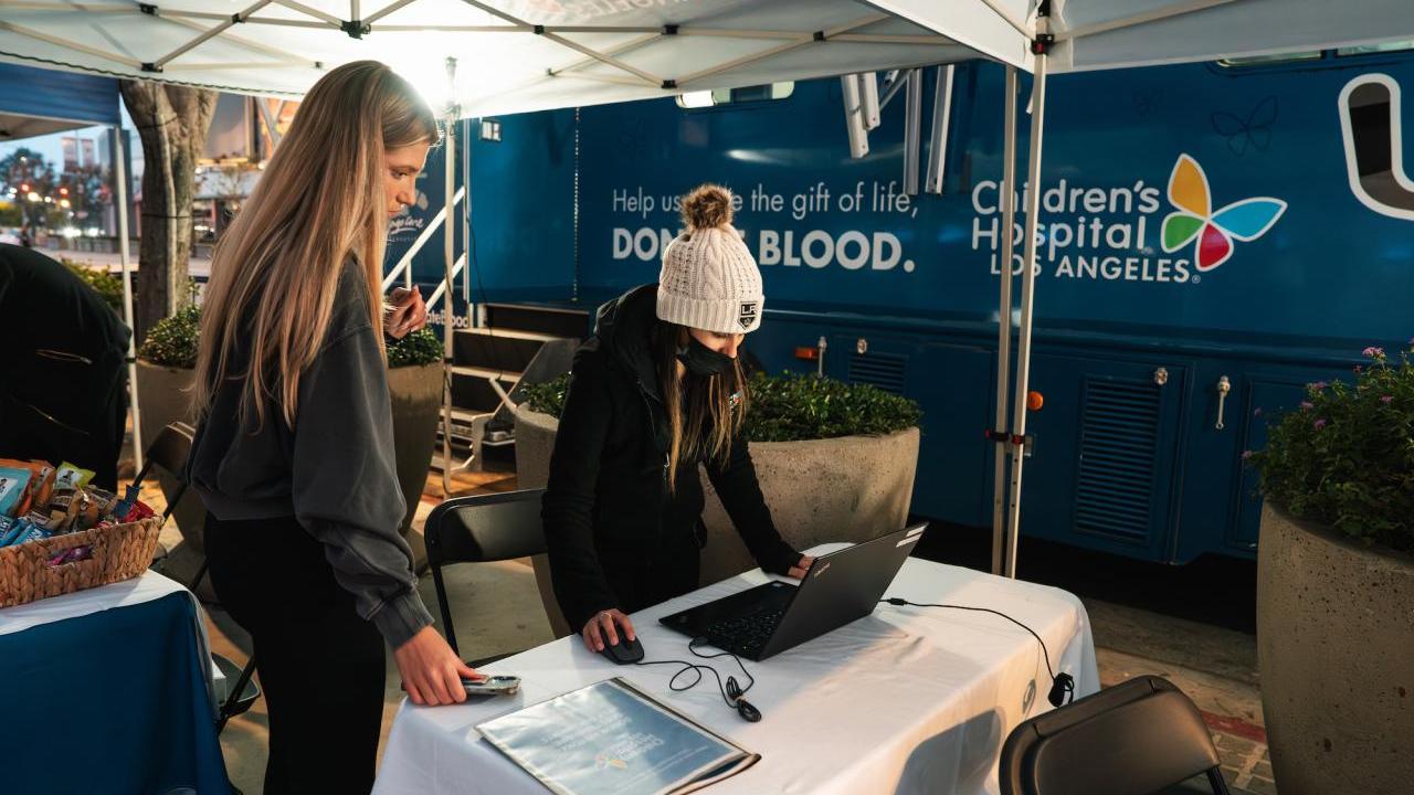 An LA Kings fan registers to donate blood outside of Crypto.com Arena prior to the LA Kings home game.