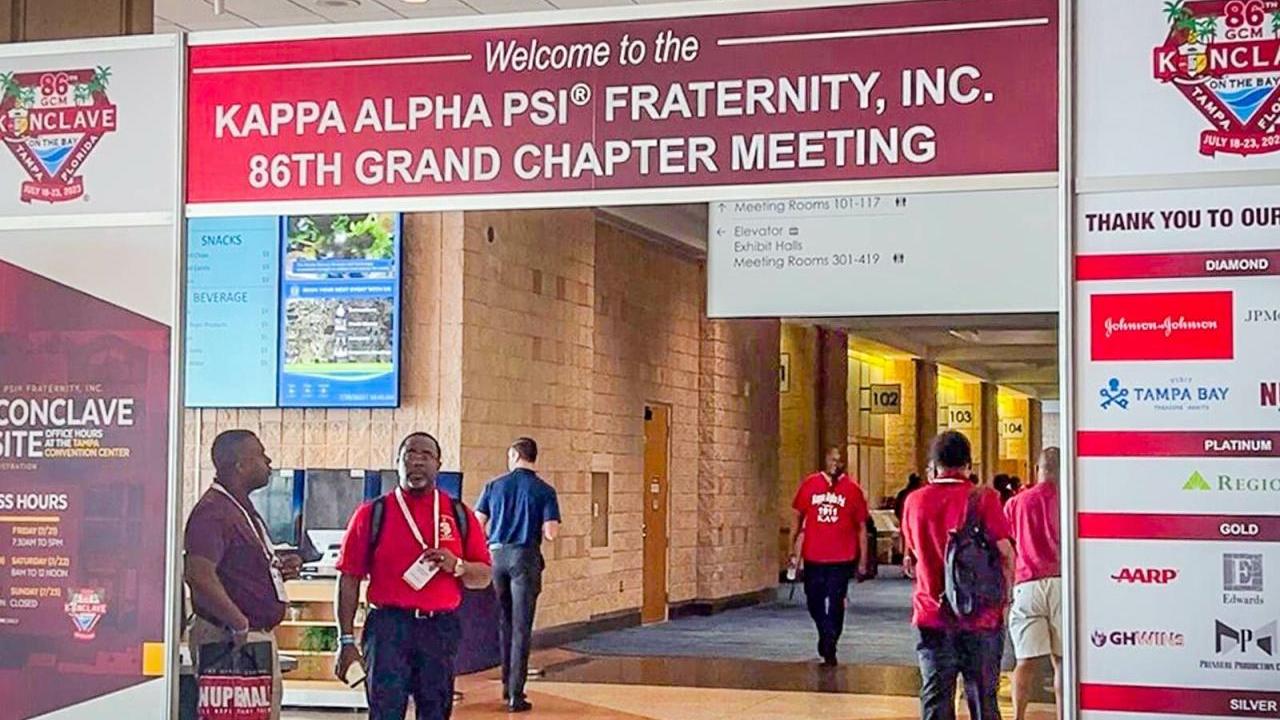 An archway sign "Welcome to the Kappa Alpha Psi Fraternity inc 86th grand chapter meeting.