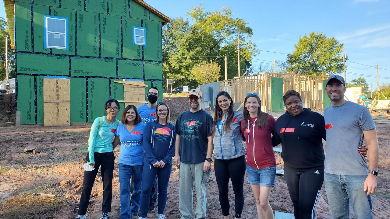 A team of volunteers at a home build site.