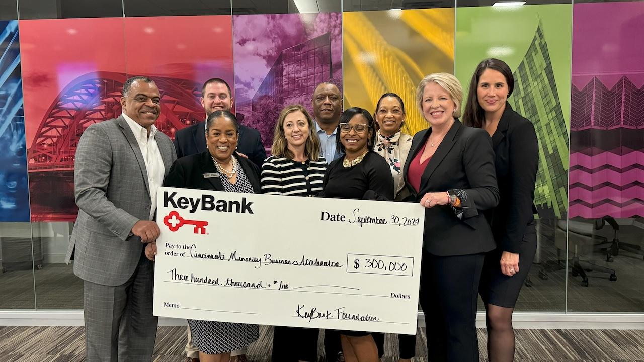 KeyBank and representatives from Cincinnati’s Minority Business Accelerator shown with a $300,000 grant check.
