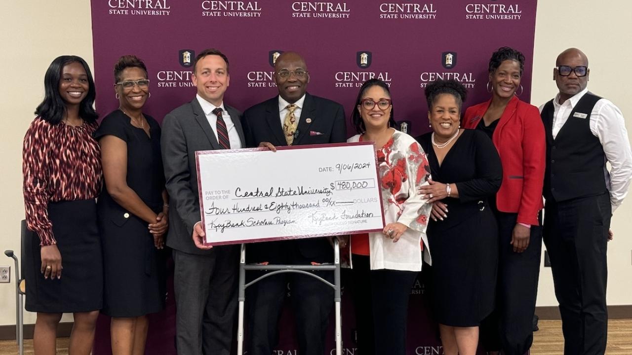 KeyBank and representatives from ,  Central State University shown with a $480,000 grant check.