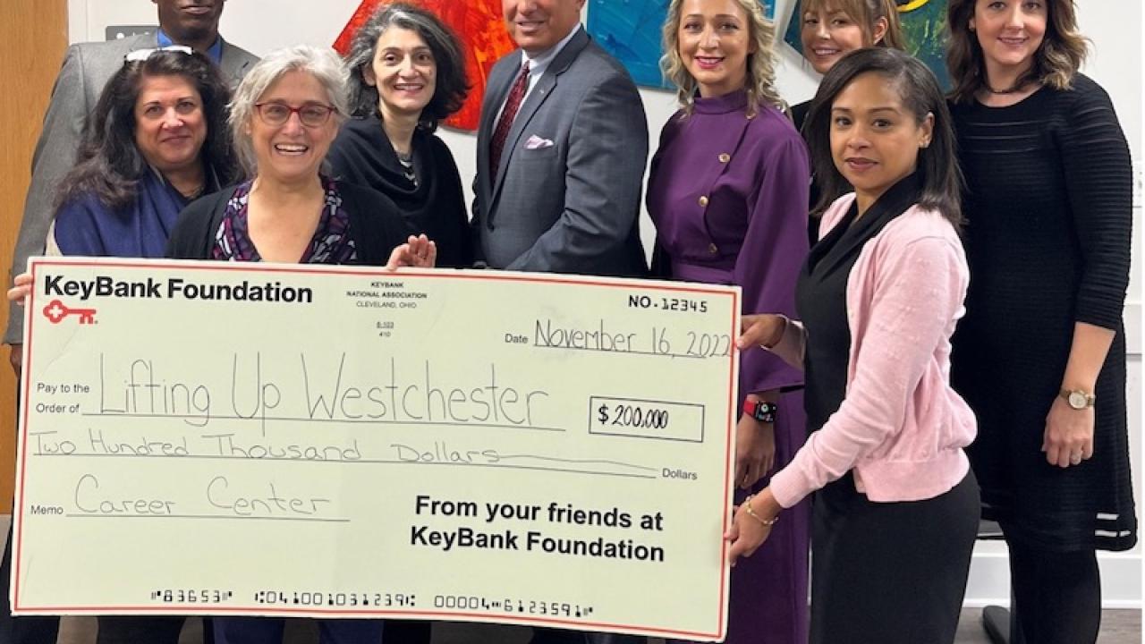 Pictured from left: Charles Stott, LUW Director of Shelters; Willa Brody, LUW Chief Operating Officer; Deborah Hertz, LUW Director of Program Design; Anahaita Kotval, LUW Chief Executive Officer: John Manginelli, KeyBank Market President, Elona Shape, KeyBank Area Retail Leader; Analisha Michanczyk, KeyBank Corporate Responsibility Office, Sybil St. Germain, KeyBank Philanthropy Coordinator; and Edona Ismaji, KeyBank Experience Leader.