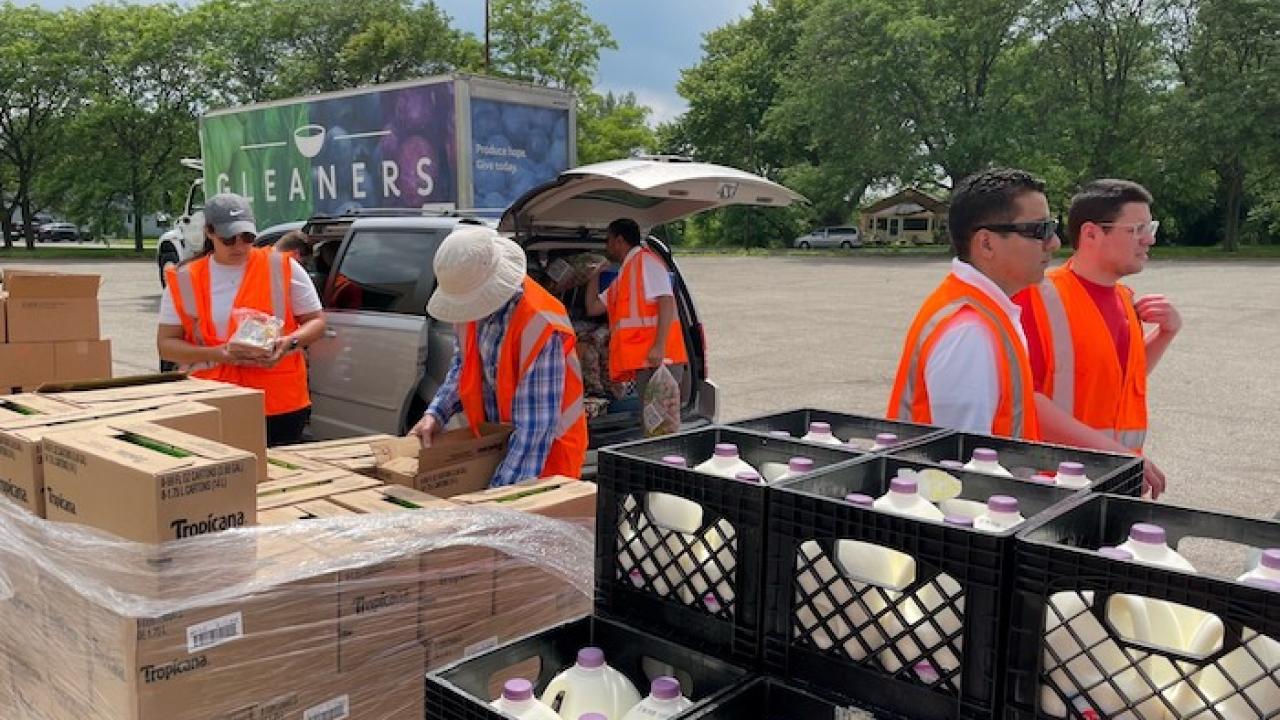 KeyBank volunteers sorting food for donations.
