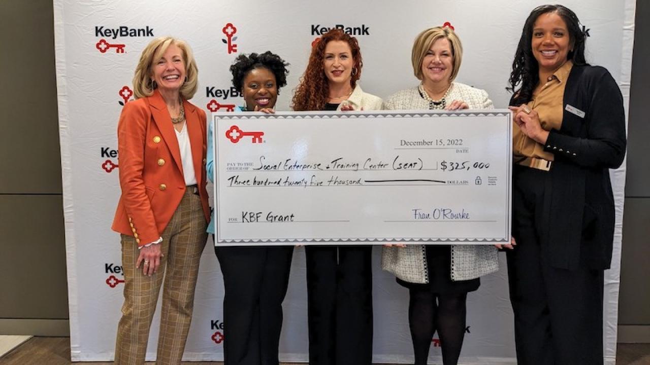 KeyBank and SEAT present check for $325,000.