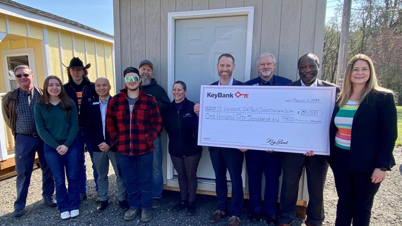 KeyBank and Team St. Vincent de Paul Society of Lane County with presentation check.