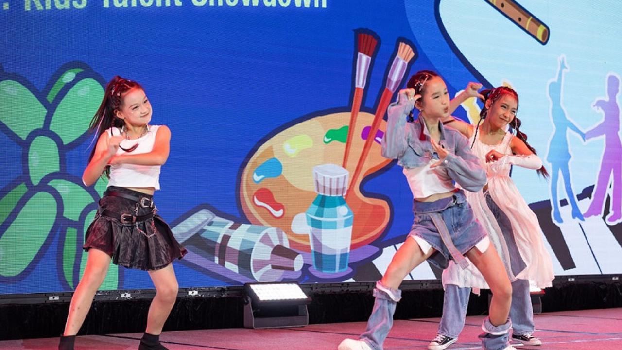 Children dancing on stage at the Kids Talent Showdown