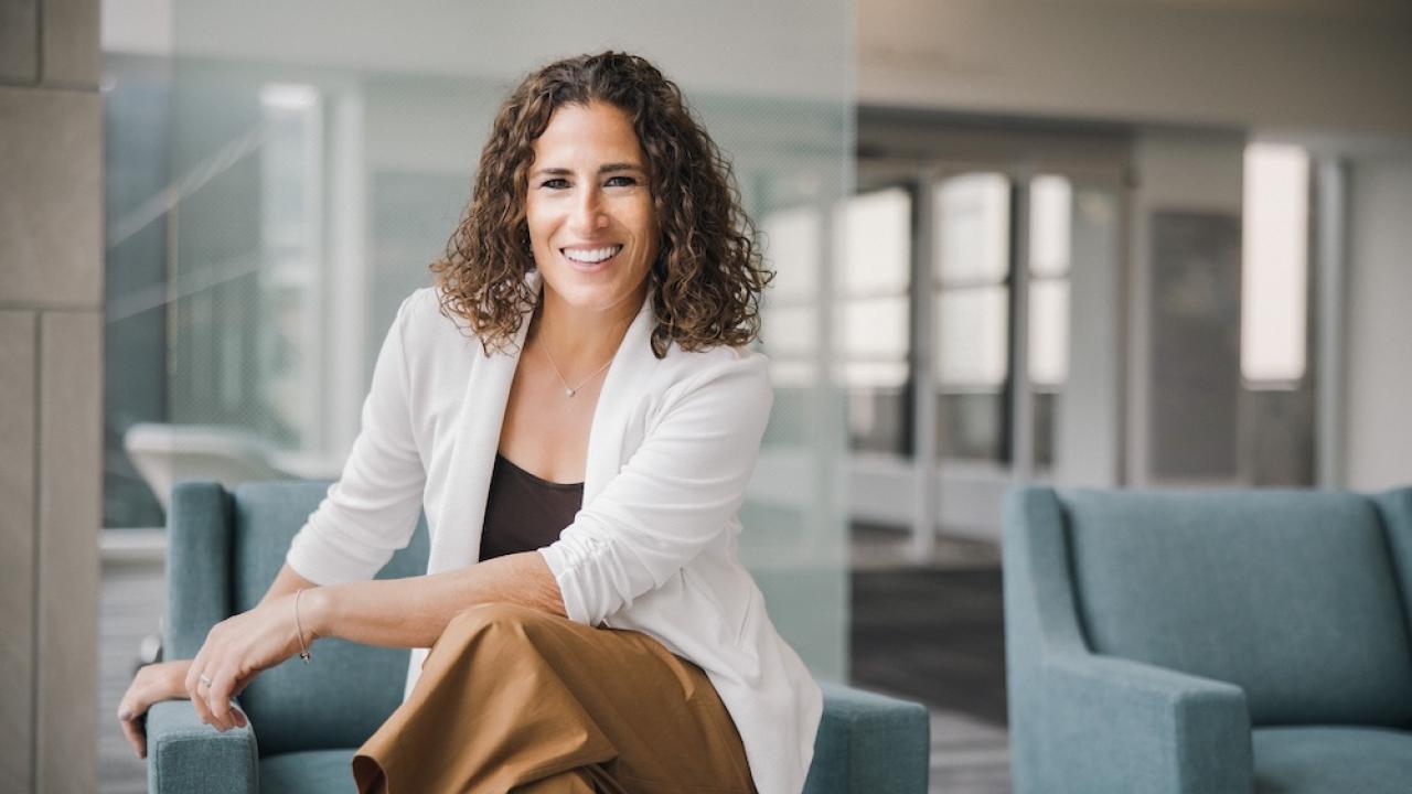 Kimberly Etchings posing at the Principal headquarters. 