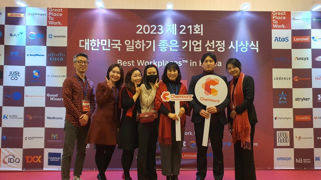 Group of people smiling at awards event