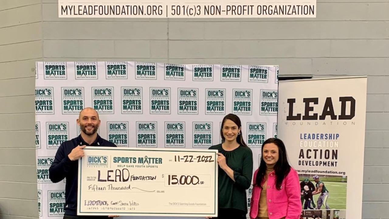 Lead Foundation being presented with a check.