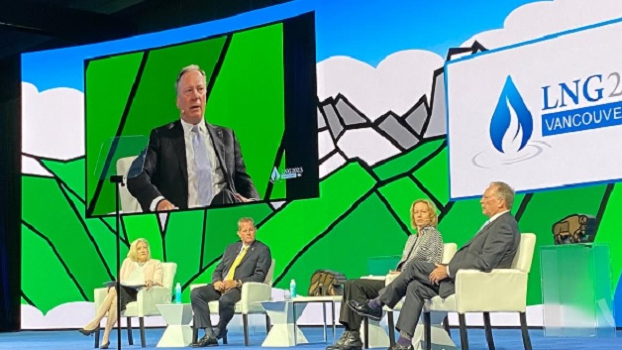 People sat on stage at the LNG2023 conference