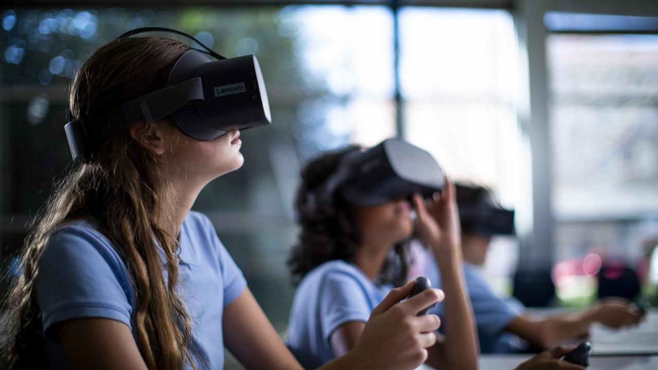 Kids in a classroom wearing VR headsets
