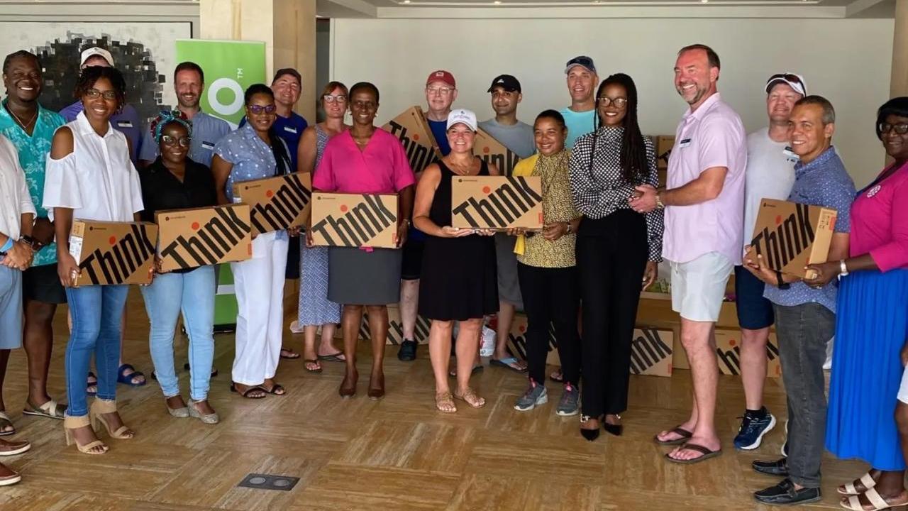 group holding lenovo thinkpad boxes