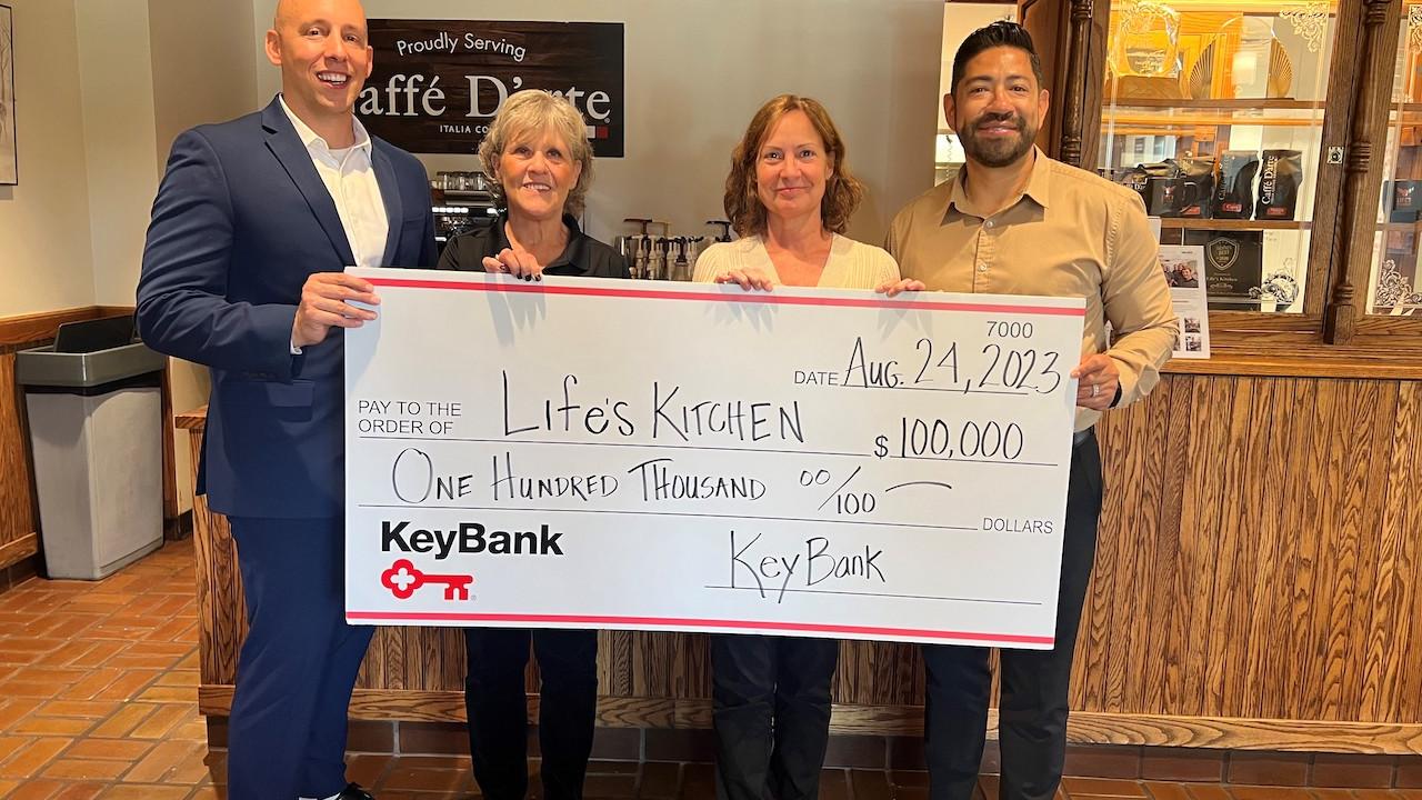 Life's Kitchen Team presented with a $100,000 check from  KeyBank