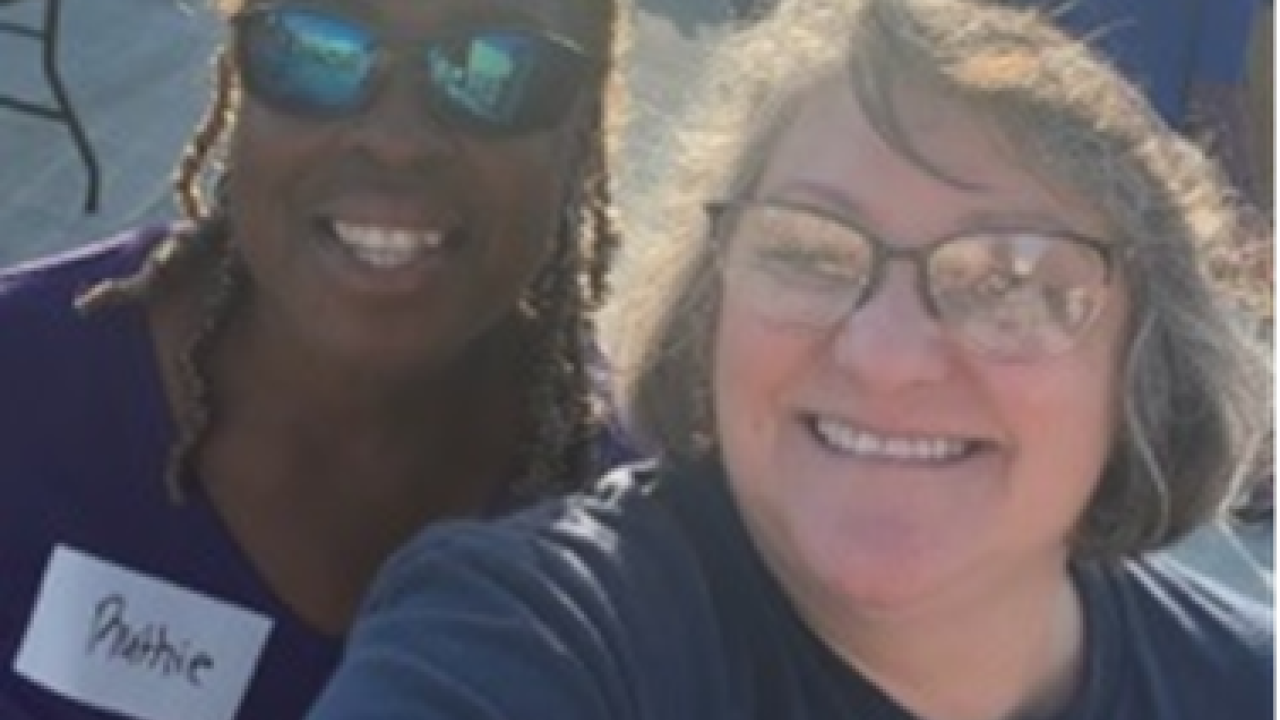 Two Aflac employees smiling