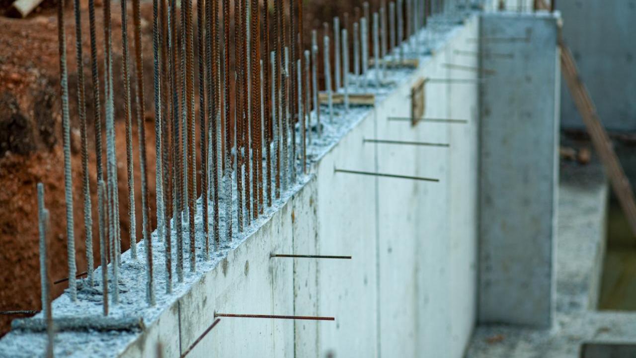 Steel bars poking out from cement