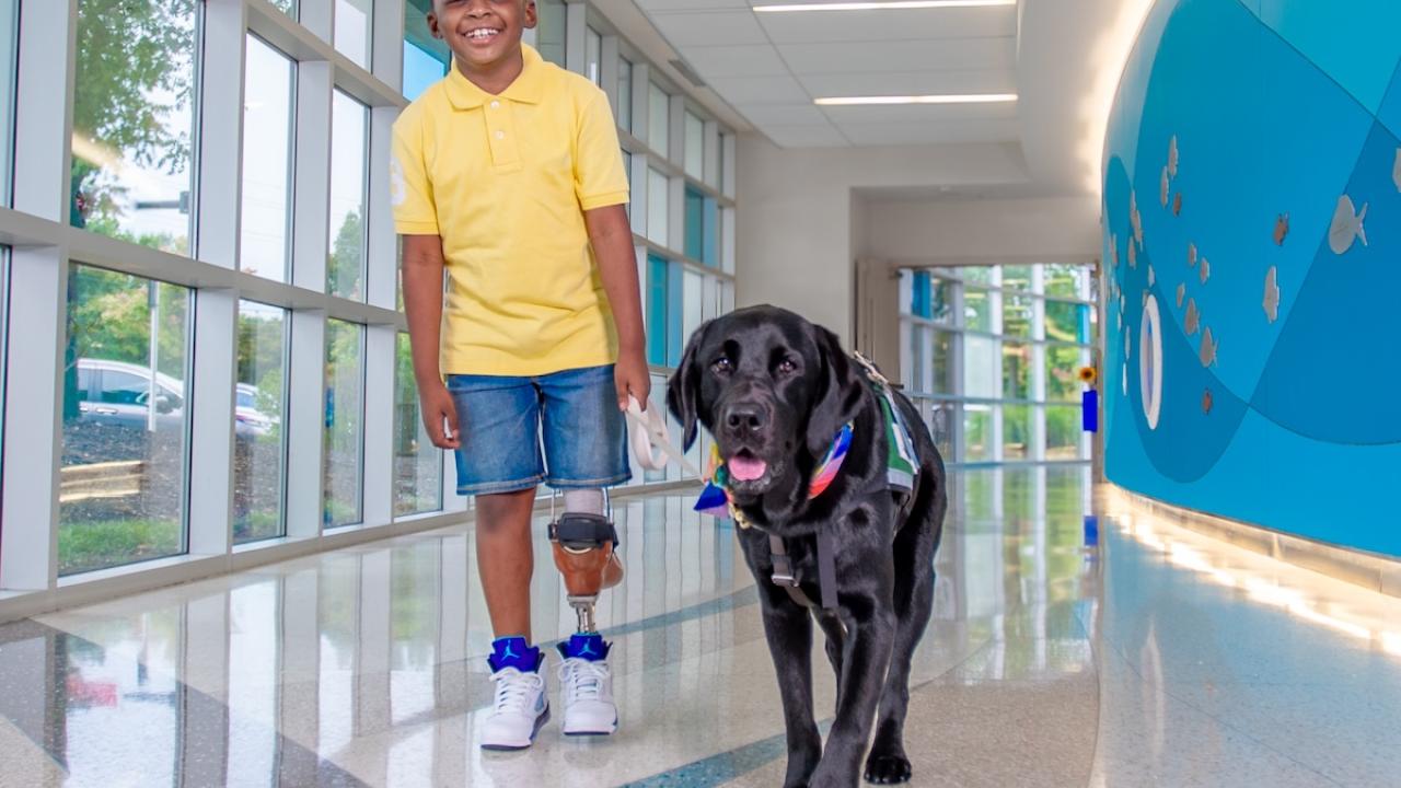 Sam and his facility dog.