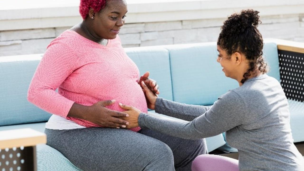 pregnant woman receiving maternity care