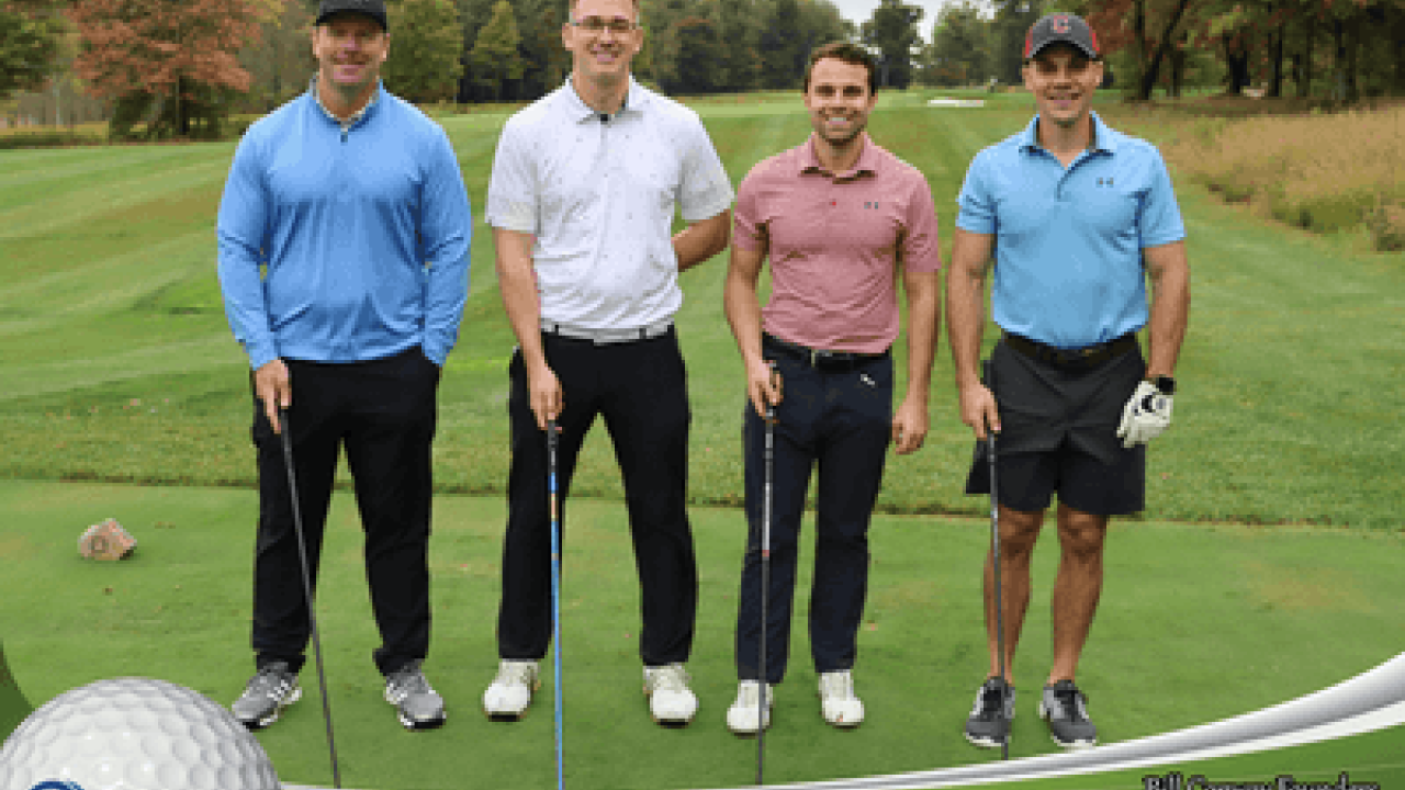 Covia Employees playing golf