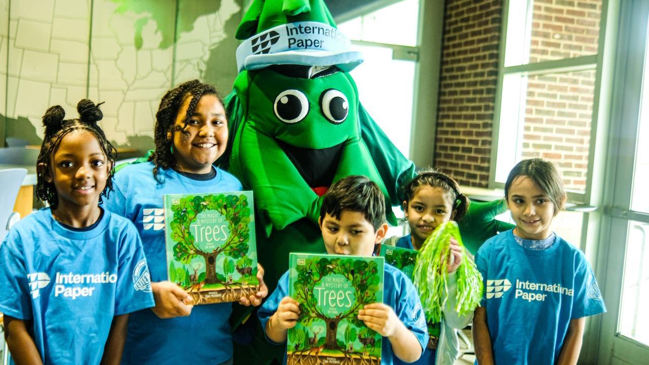 5 kids and the International Paper Mascot