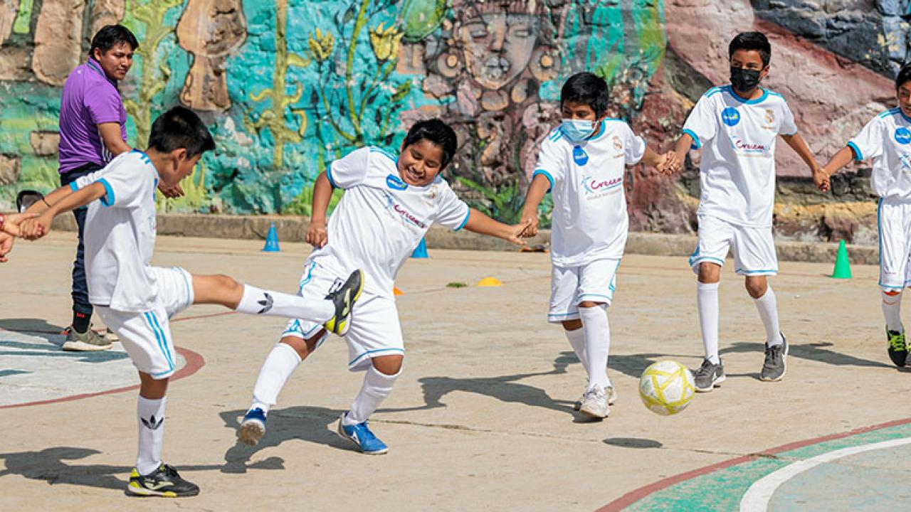 Children playing soccer