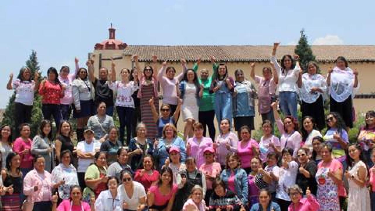 A group of people posed outside.