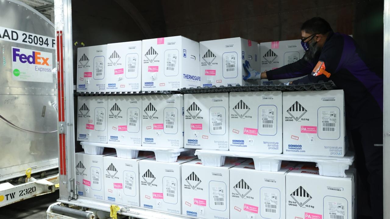 FedEx truck filled with boxes of vaccines