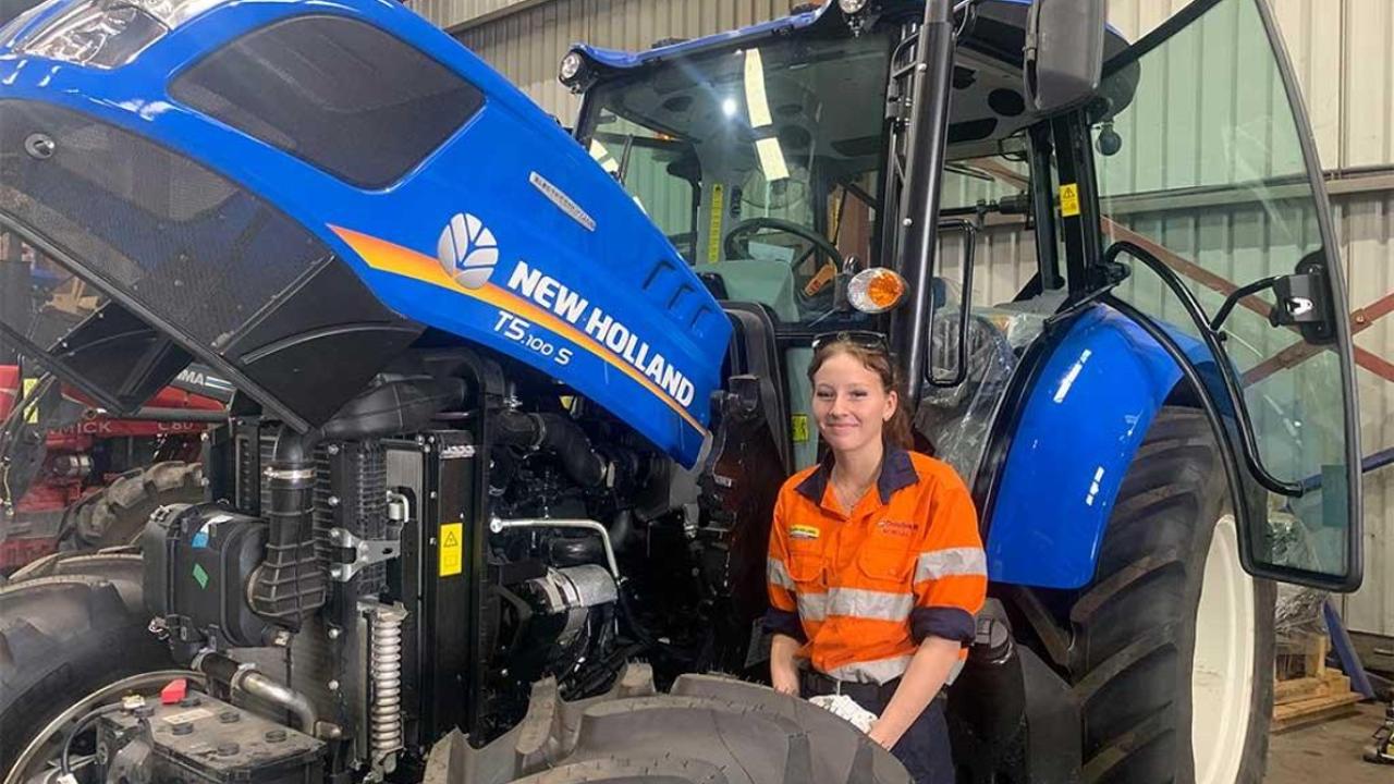 woman standing in front of equipment 