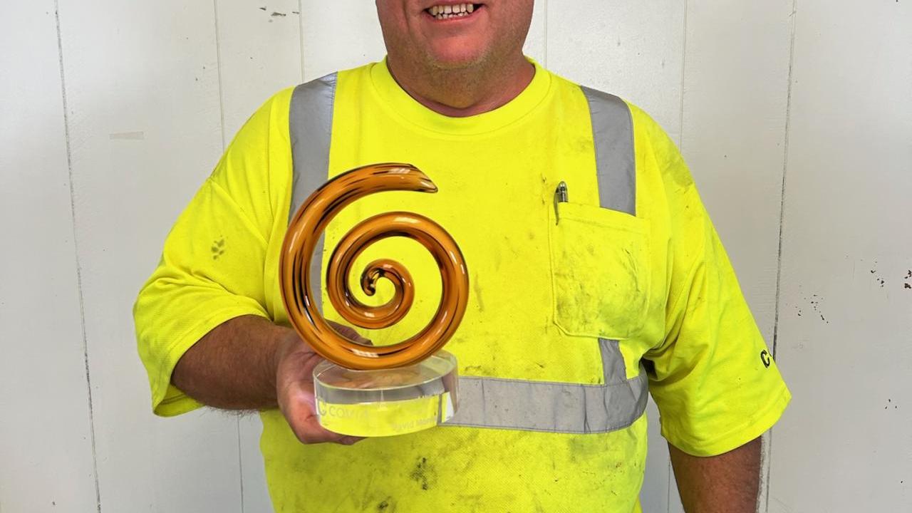 Person holding award