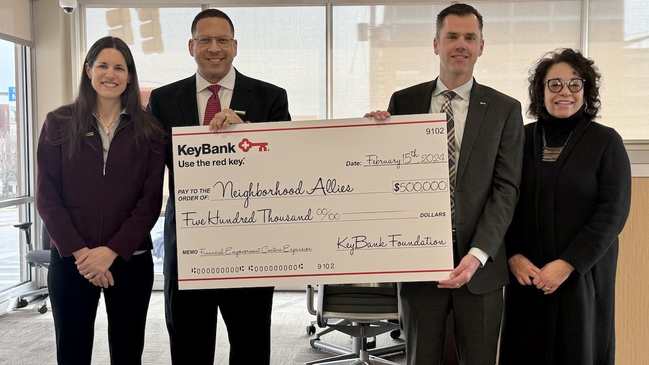 KeyBank and Neighborhood Allies Team Members shown with a $500,000 grant check.