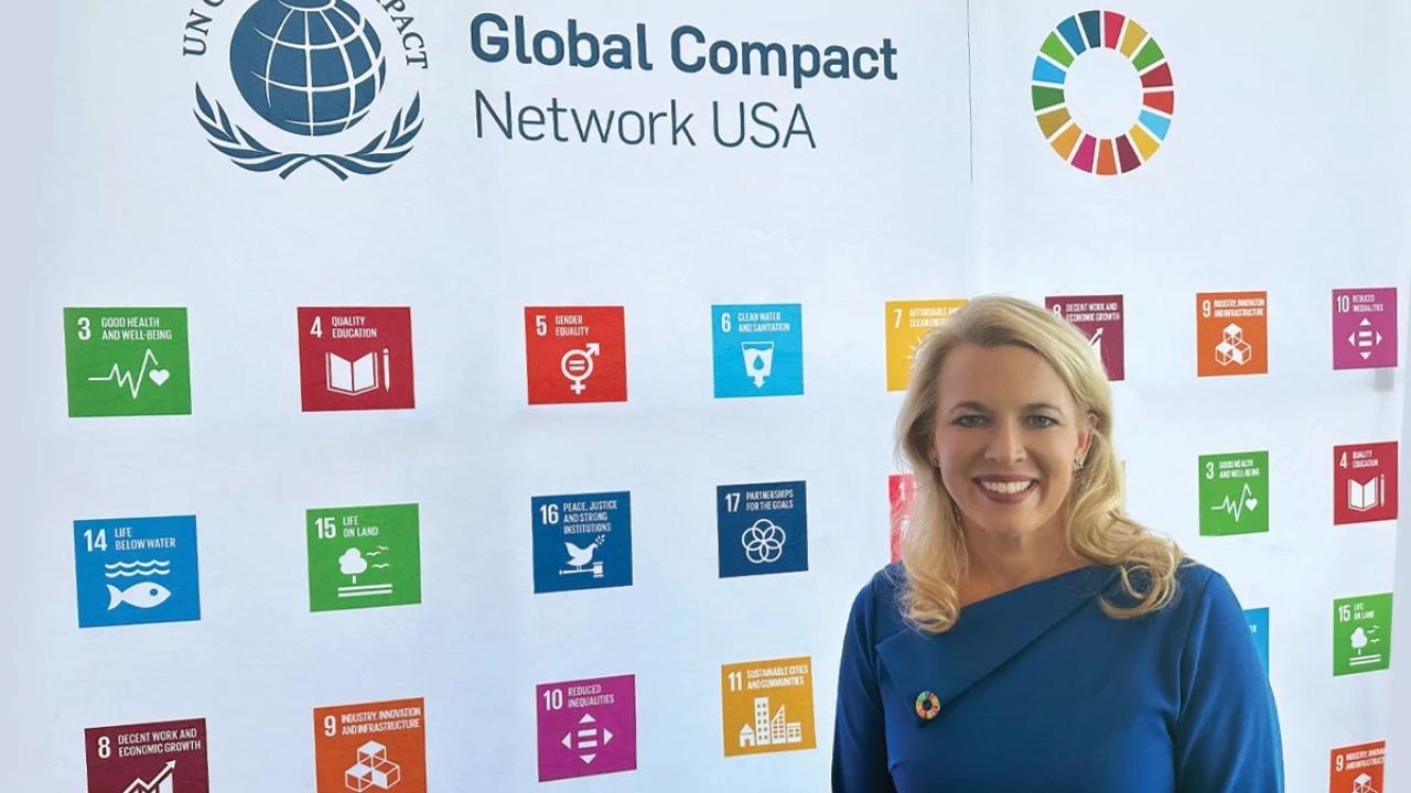 Niki King smiling for photo at the event