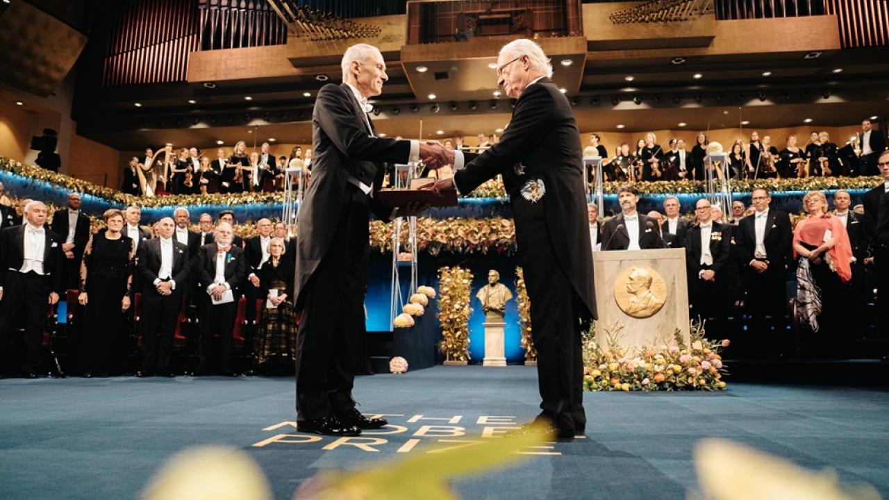Dr. Moungi Bawendi being awarded the Nobel Prize for Chemistry.