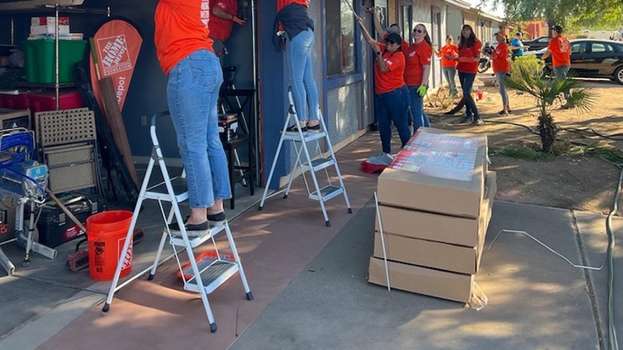 The Home Depot Foundation and HandsOn Greater Phoenix volunteers work on a veterans home.