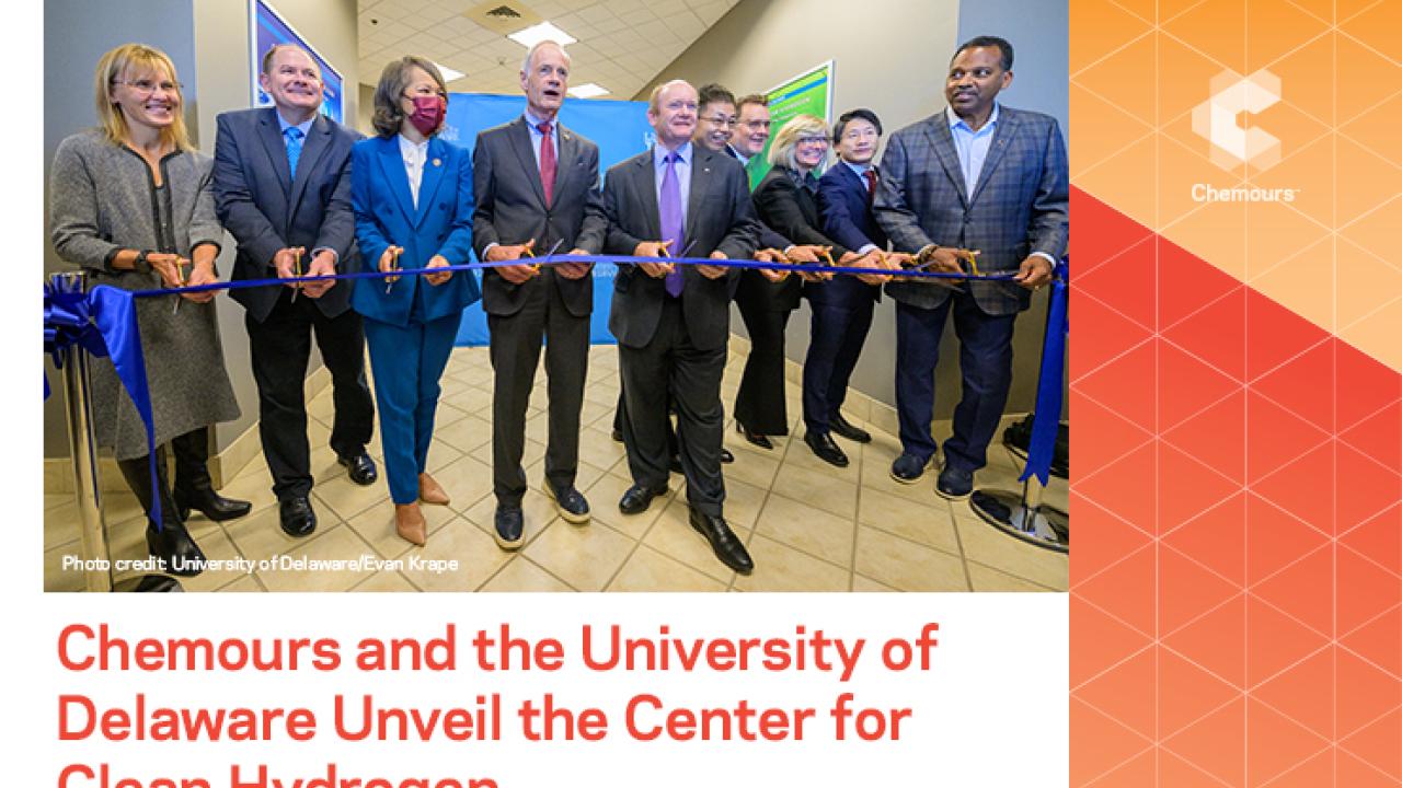 Group of people at a ribbon cutting 