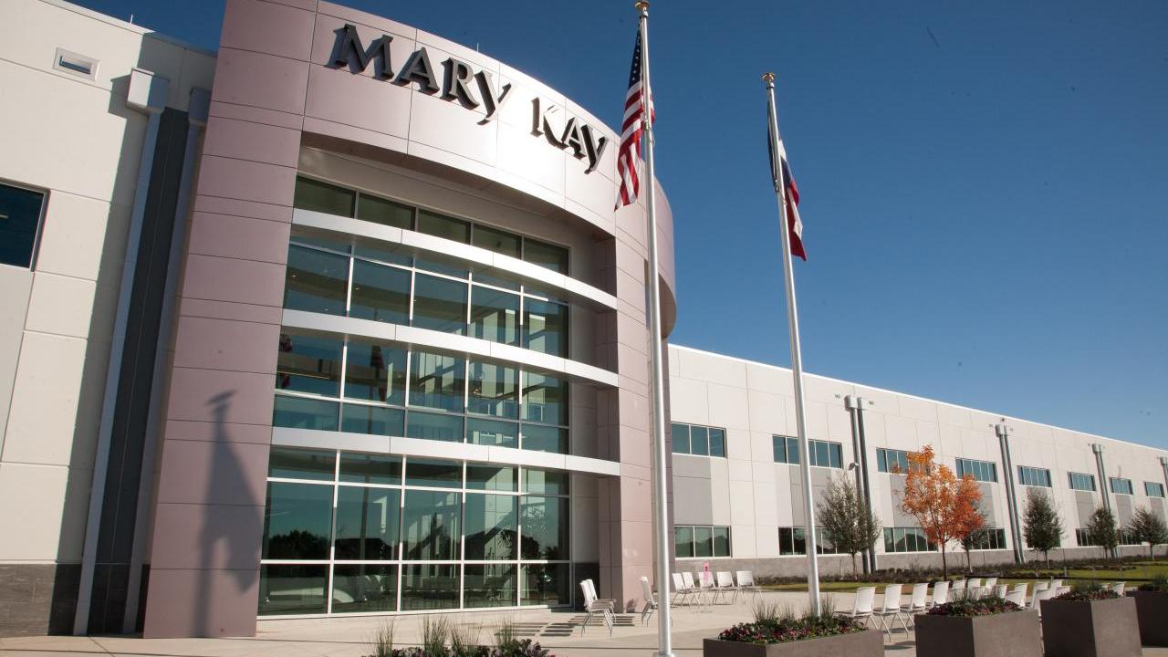 A large office building with "Mary Kay" sign.