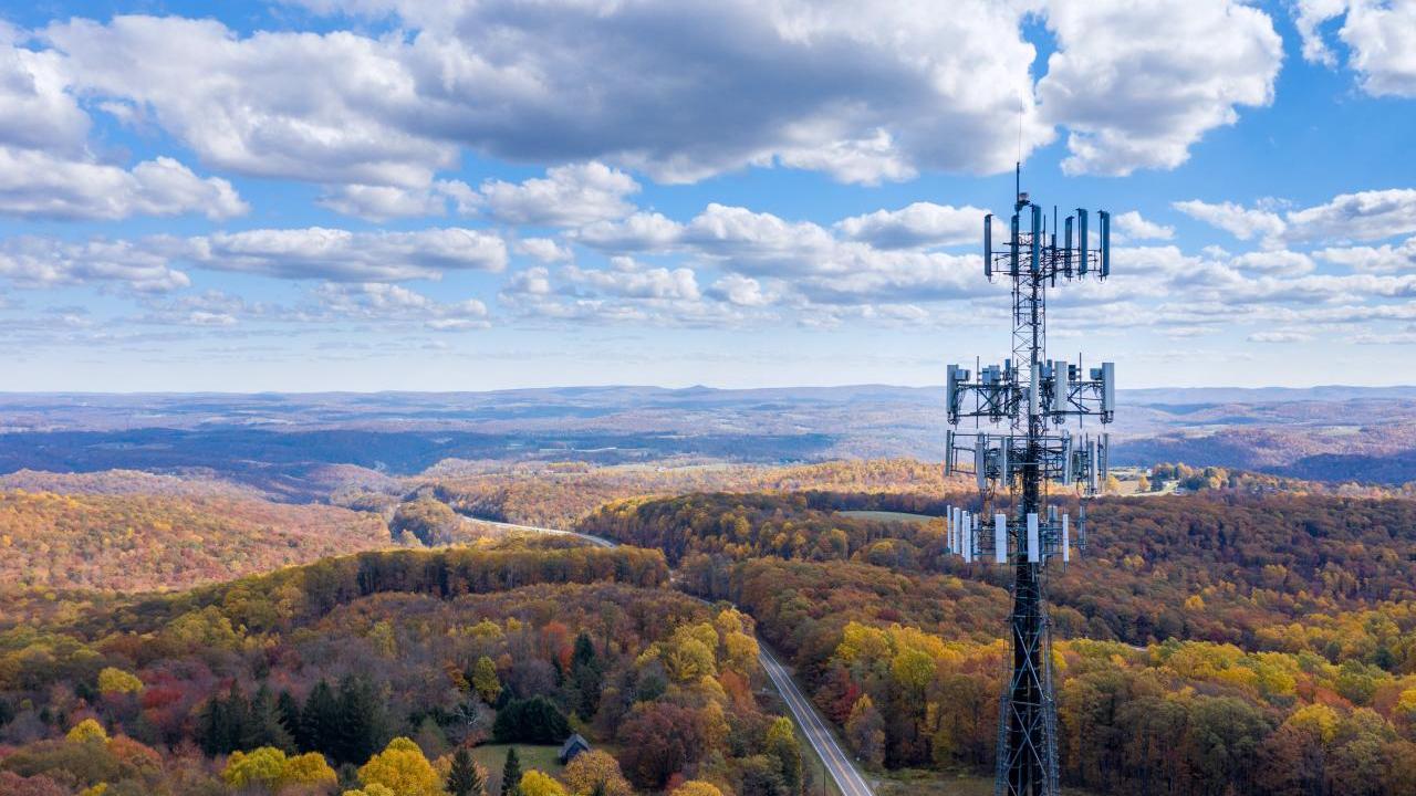Tower shown in a beautiful field.