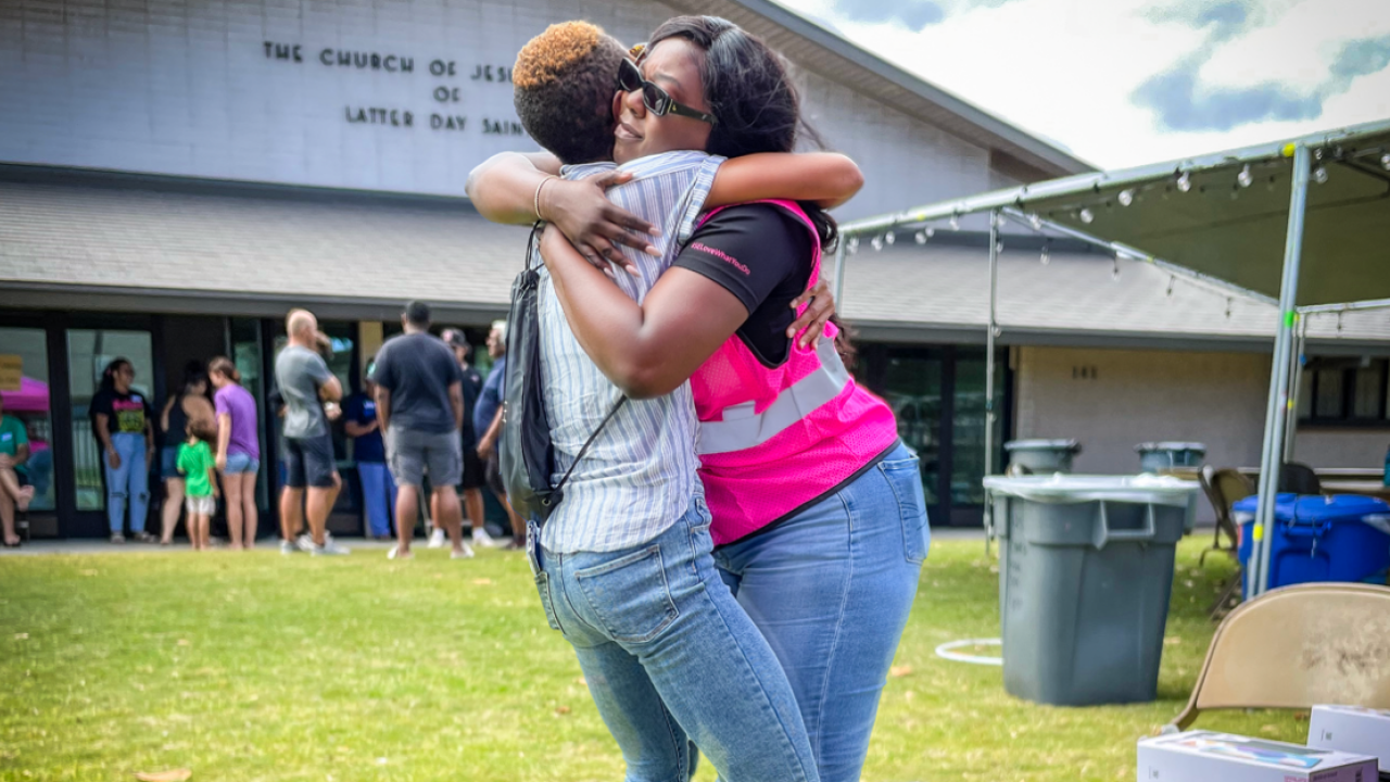 Two people hugging