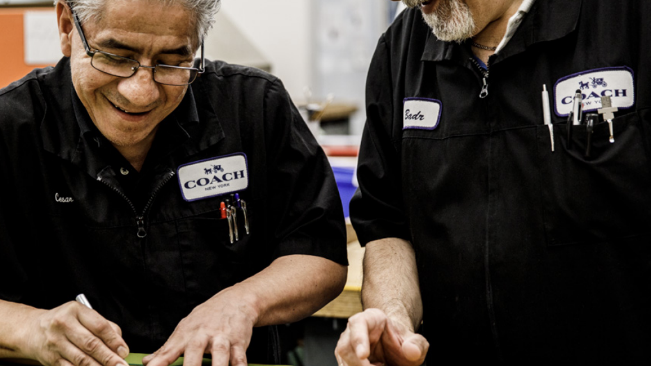 two people working together