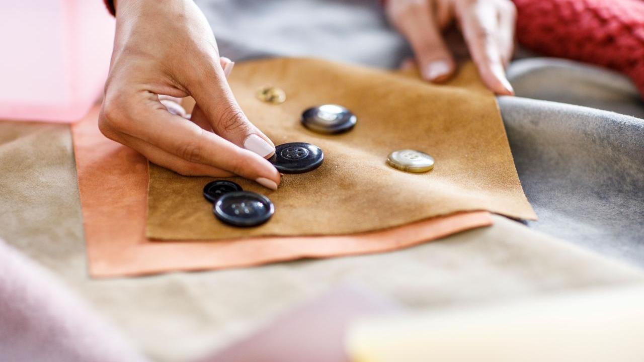 Coach designer matching buttons to fabric