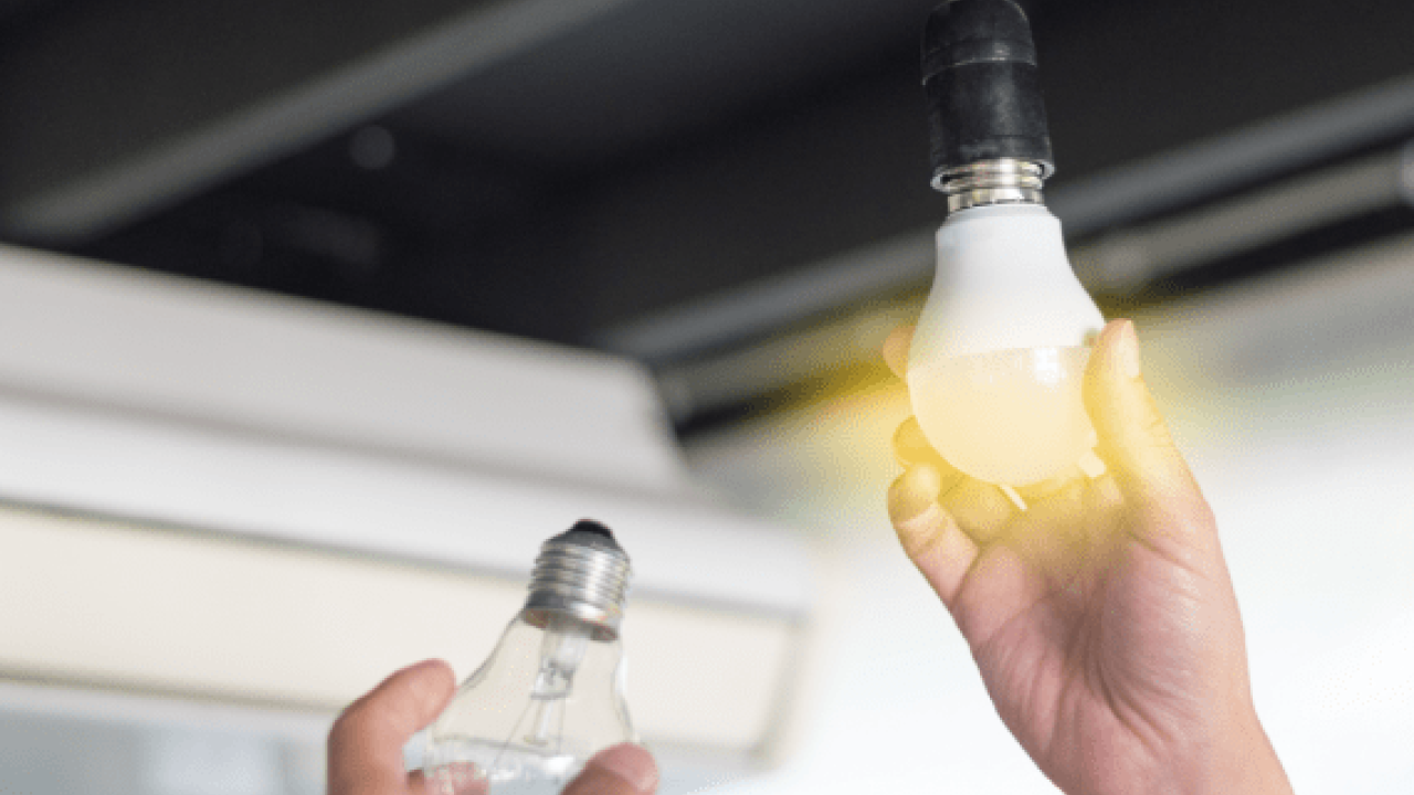 Changing a lightbulb.