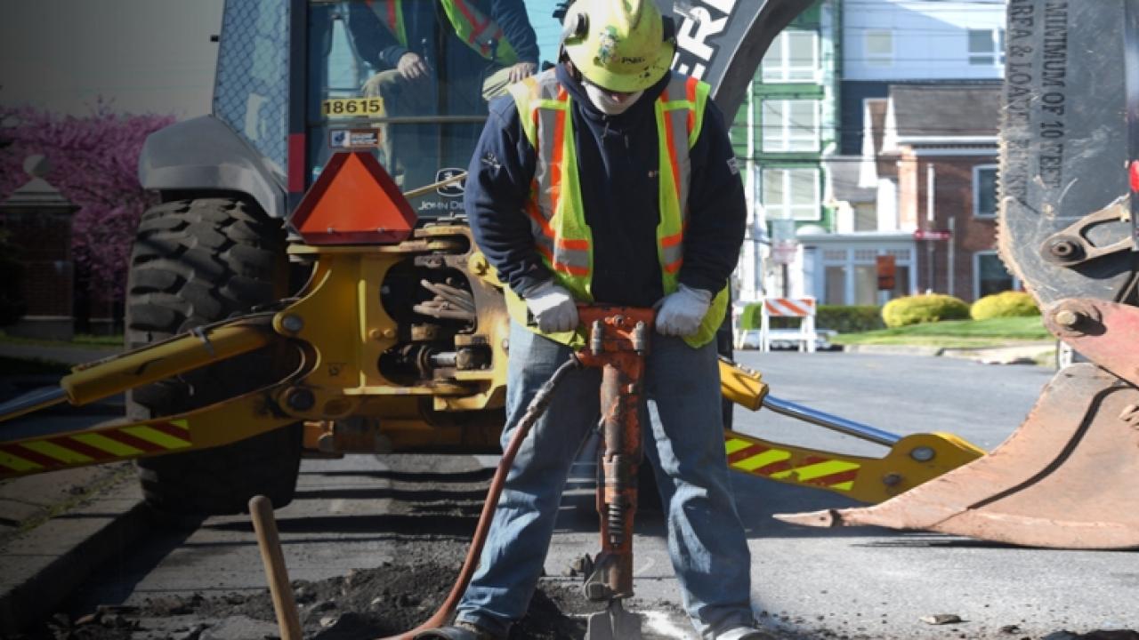PSEG worker using a jackhammer.